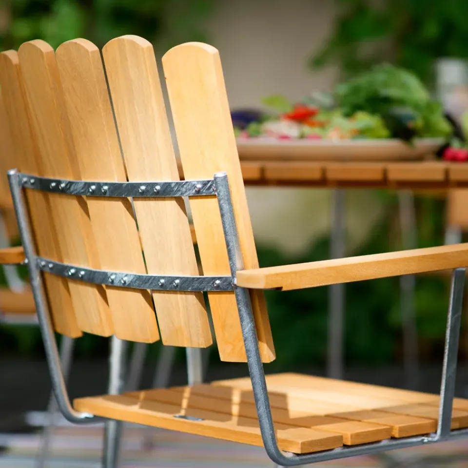 Seating^Grythyttan Stålmöbler A2 armchair, Teak-hot-dip galvanized stand Brown
