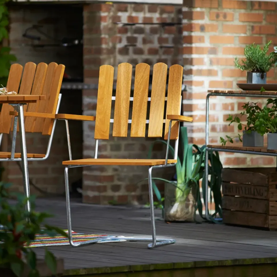 Seating^Grythyttan Stålmöbler A2 armchair, Teak-hot-dip galvanized stand Brown