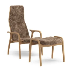 New Swedese Lamino armchair and footstool oiled oak/sheepskin, Sahara (nougat-) Brown