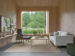 New Swedese Lamino armchair and footstool oiled oak/sheepskin, Sahara (nougat-) Brown