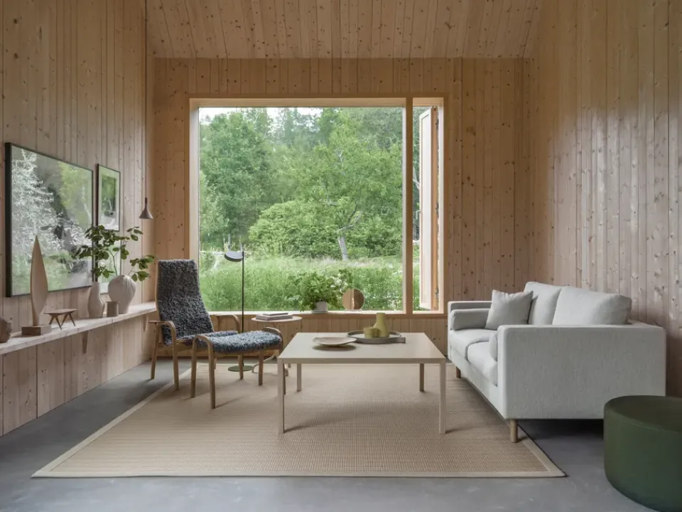 New Swedese Lamino armchair and footstool oiled oak/sheepskin, Sahara (nougat-) Brown