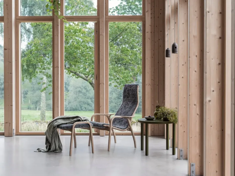 New Swedese Lamino armchair and footstool oiled oak/sheepskin, Sahara (nougat-) Brown